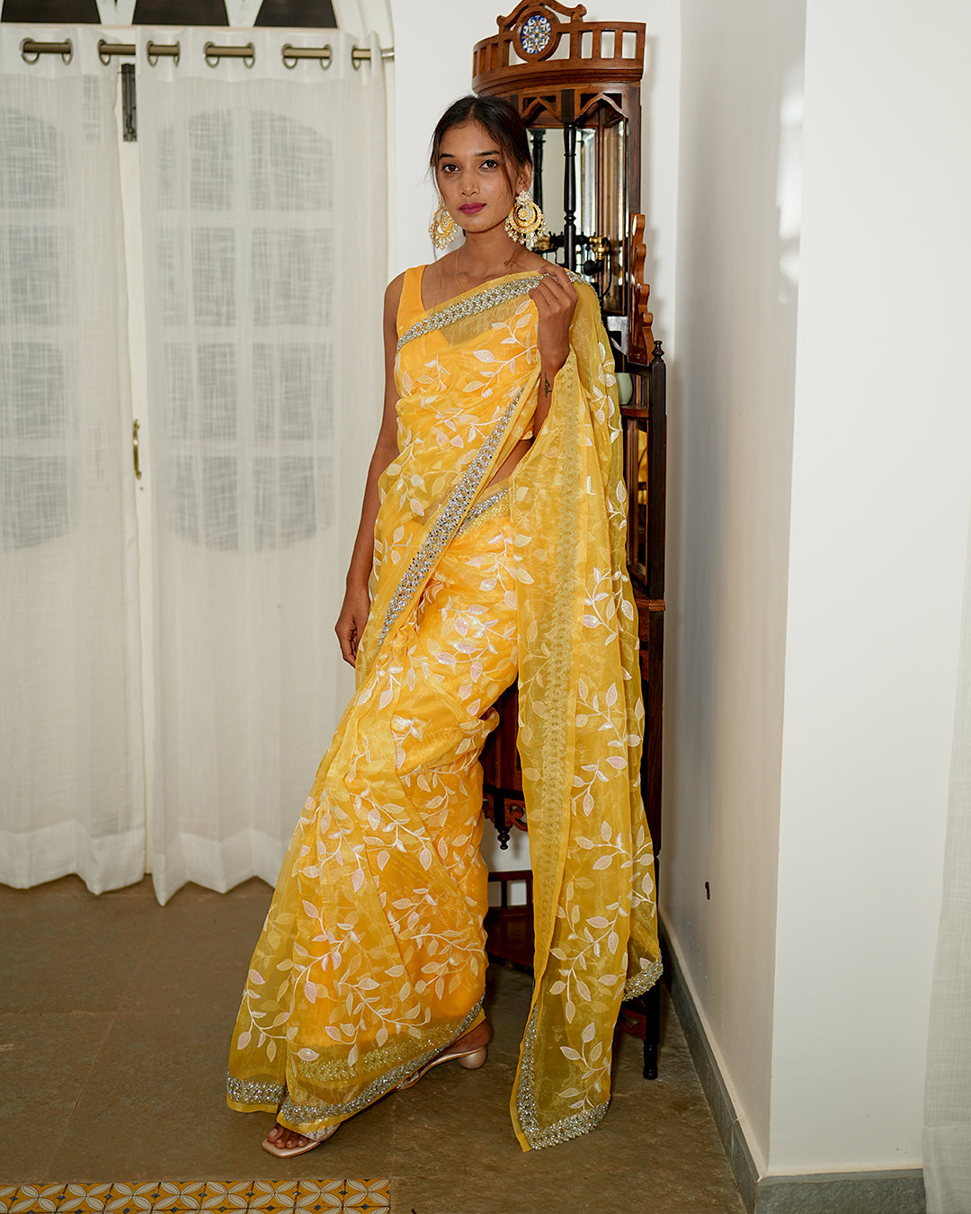 Amber yellow mirror cut organza saree